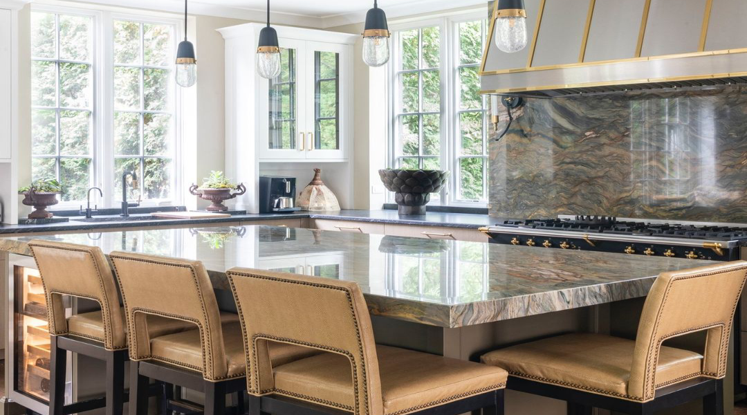 Elegant kitchen with marble island and gold accents